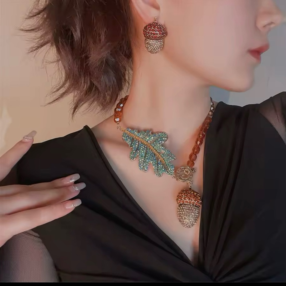 Elegant Beaded Necklace with Oak Leaf and Acorn Pendant
